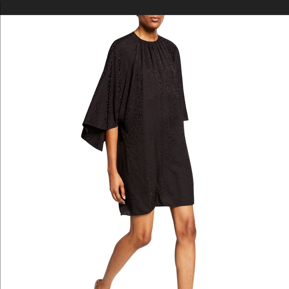 Johanna Ortiz Nostalgic Mini Dress. Black silk leopard print size 8. $750
